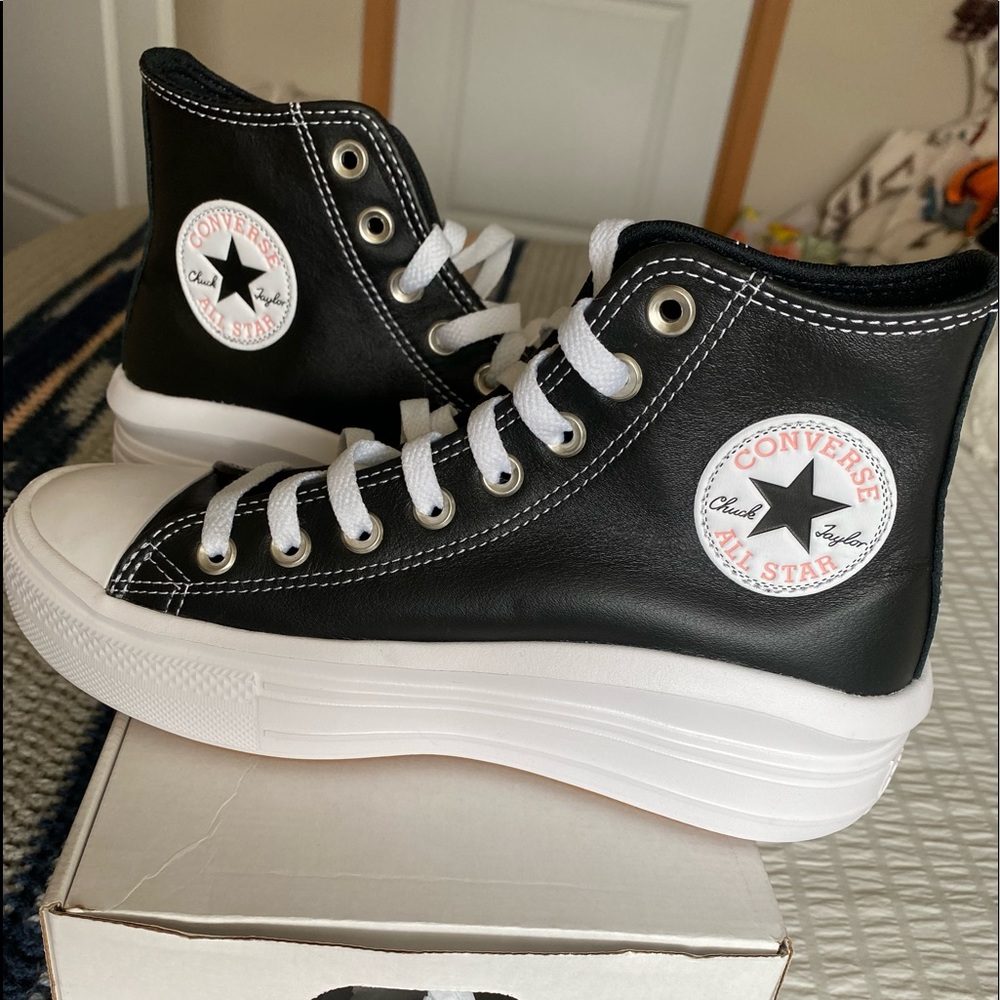 Women’s Converse Chuck Taylor All Star Move high tops.